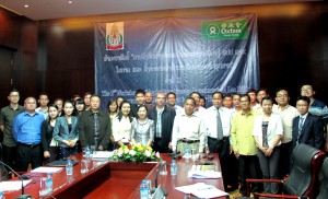 Participants pose for a photograph at the International Conference on Foreign Investments in the Agricultural Sector of Laos. 