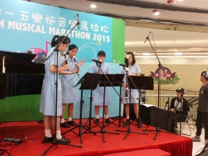  Lois, 2nd from left, playing recorders with her schoolmates.  
