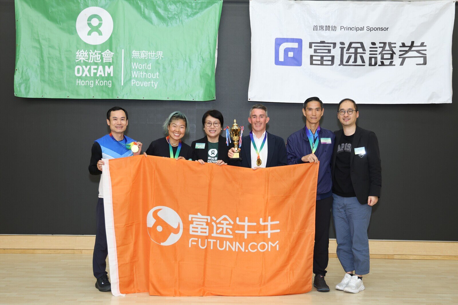 Oxfam Trailwalker Mixed Team Champion Team 8002 completed in 14 hours and 58 minutes, with team members Chan Kwok Keung, Chung Sing Hong, Lodder Jo and Xie Wen Fei.