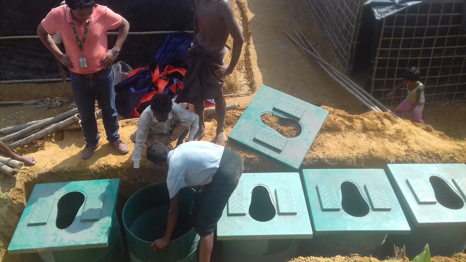 Oxfam monitoring the construction work of emergency latrines at block C2, Lambashiya, Ukiya, Cox's Bazar. Oxfam monitoring the construction work of emergency latrines at block C2, Lambashiya, Ukiya, Cox's Bazar.