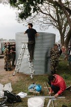PR3：Oxfam has begun delivering aid to those affected by the earthquake by providing clean water, toilets and shelter. We have erected a water tank that can hold 11,000 litres of clean drinking water at the Tundikhel camp in Kathmandu. (Aubrey Wade / Oxfam)