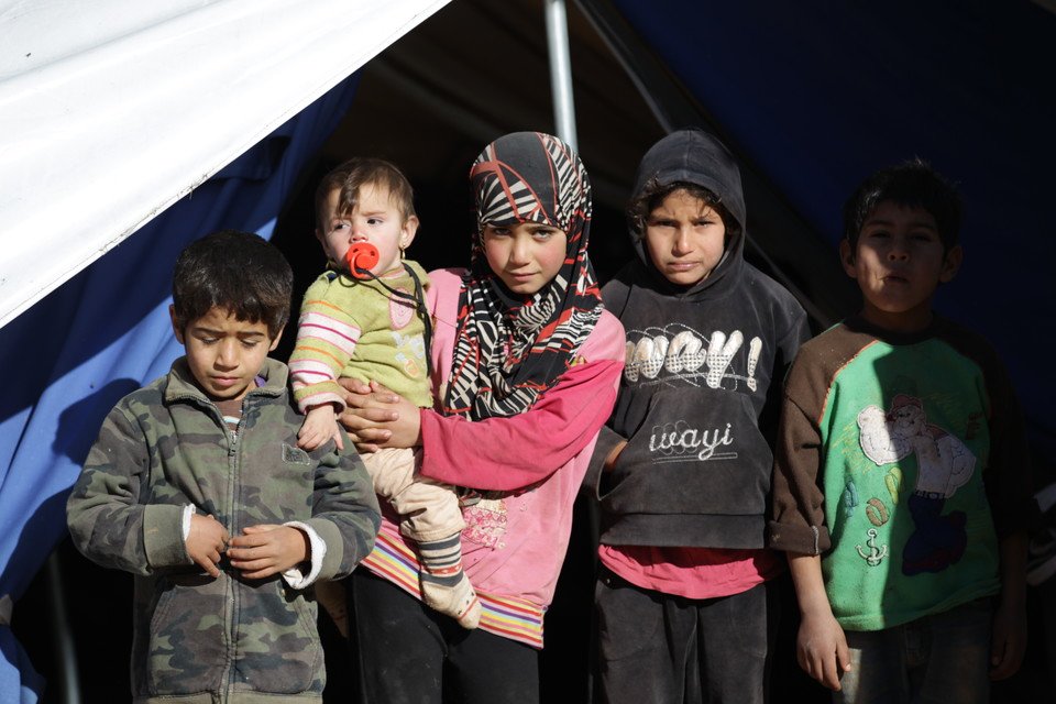 Fatima (centre) and her family fled from Hama in Syria two years ago, and have settled in a camp for displaced people on the border of northern Syria near Turkey. Fatima’s father has brought her to the clinics he can afford for a skin disorder that is affecting her ability to walk, but to no avail. Without work due to the war, her father cannot afford to bring her to Turkey to receive better medical treatment.