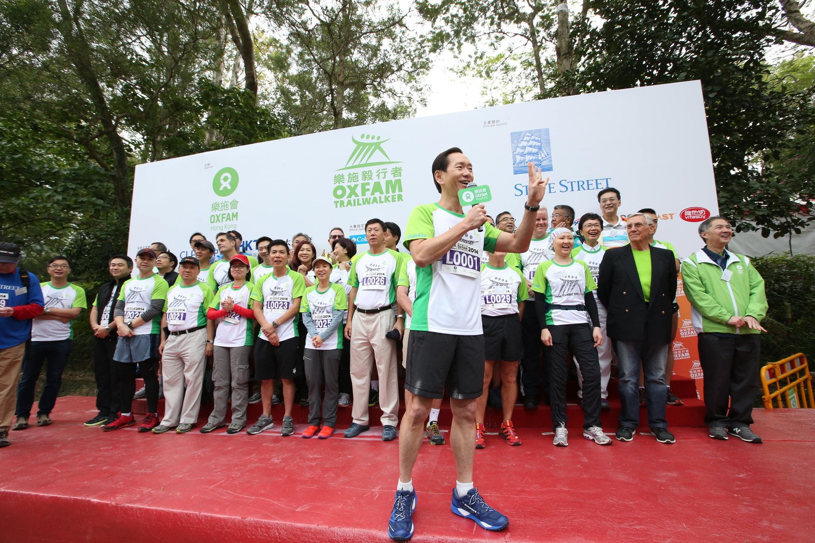 Bernard Chan, Chair of Oxfam Trailwalker Advisory Committee, delivering the welcome speech at the Oxfam Trailwalker 2014 Kick-Off Ceremony.