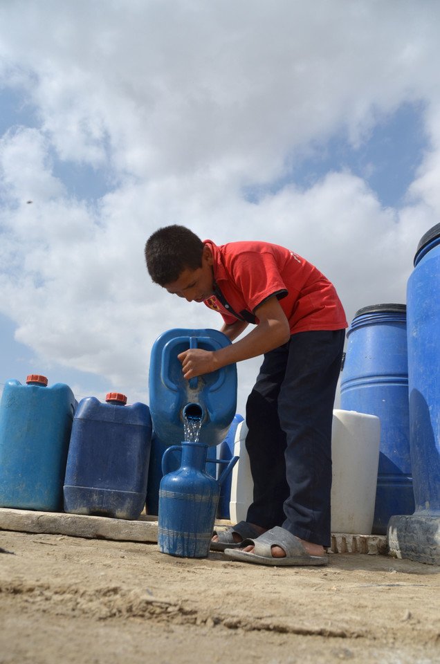 Oxfam is providing water filters to the refugee families in the Jordan Valley so safe drinking water is available.