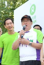 Oxfam Trailwalker 2013 Official Kick-off Ceremony was officiated by Mr. Bernard Chan, Chairman, Oxfam Trailwalker Advisory Committee (left) and Dr York Chow Yat-Ngok, Chairperson, Equal Opportunities Commission (right).