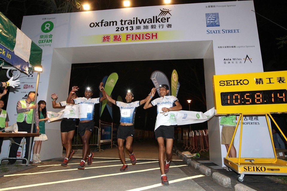 S03 “Team Columbia S1” (Photo 1) was the first to finish Oxfam Trailwalker 2013, taking only 10 hours and 58 minutes to complete the arduous trail from Sai Kung to Yuen Long. Their team members are Ram Kumar Khatri, Uttam Khatri, Gurung Bhim Bahadur, and Ram Bhandari