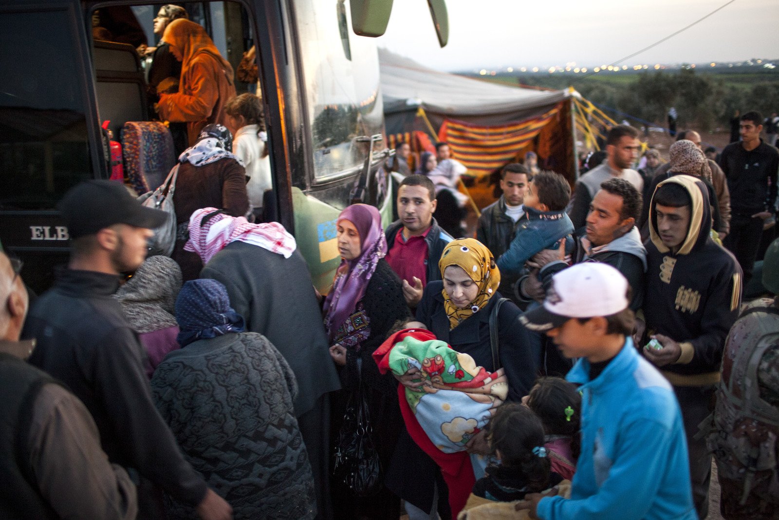 Syrian refugees fleeing to the Zaatari refugee camp in Jordan