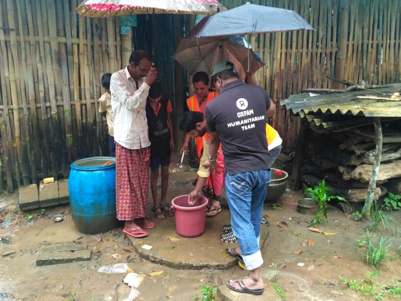 A member of Oxfam India’s humanitarian team in Wayanad, the seriously affected area, conducting a rapid assessment to understand how contaminated water there is. (Photo: Oxfam India)