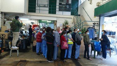 The demand for masks among cleaners in Sheung Shui was evident after they began lining up immediately after learning that there would be a mask distribution.