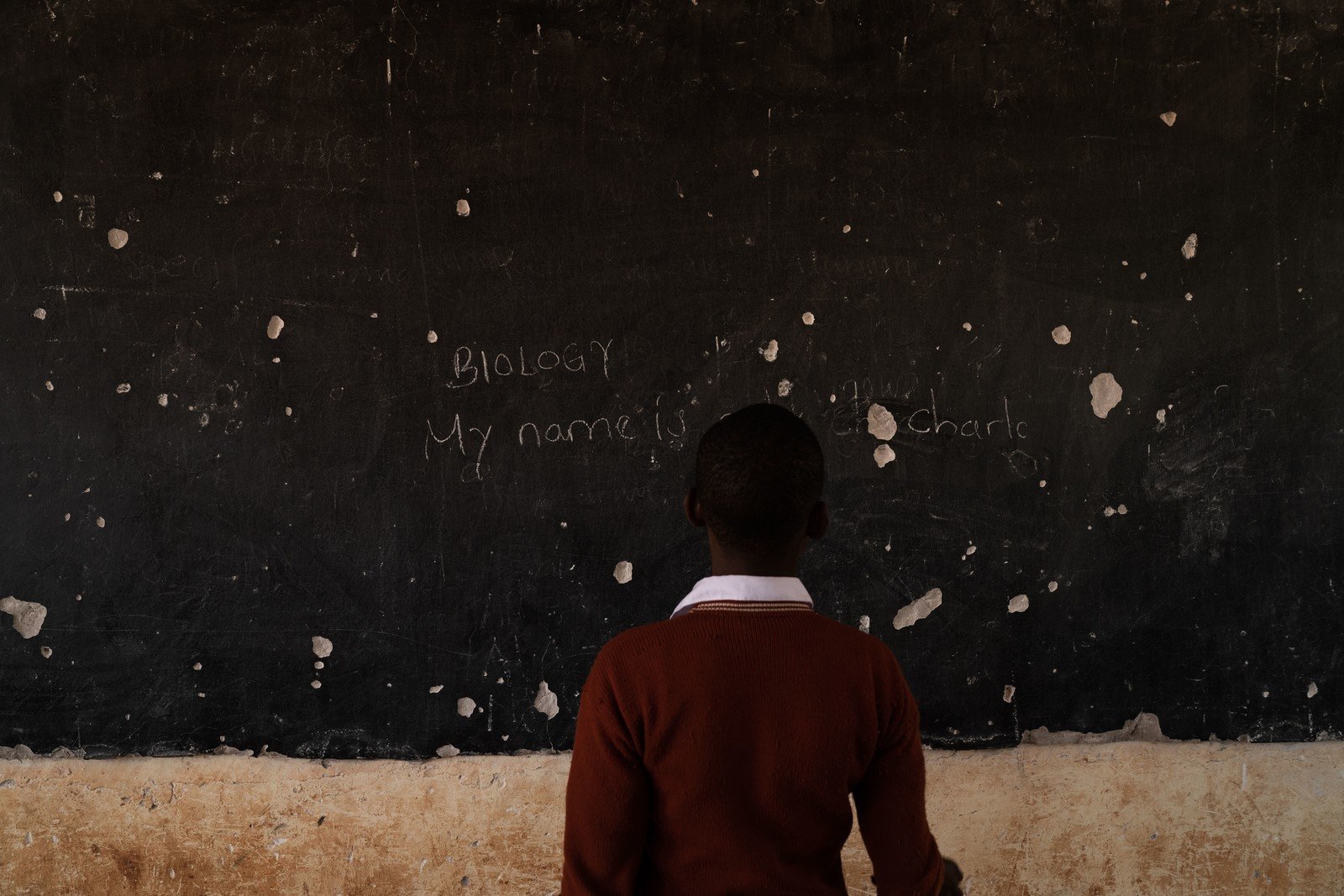 This blackboard had small holes all over it. A student shared her simple wish: ‘I hope to have a new blackboard.’