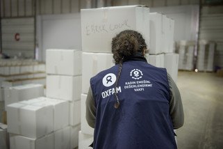 Oxfam team support the sorting of supplies at a distribution center in Gaziantep.
