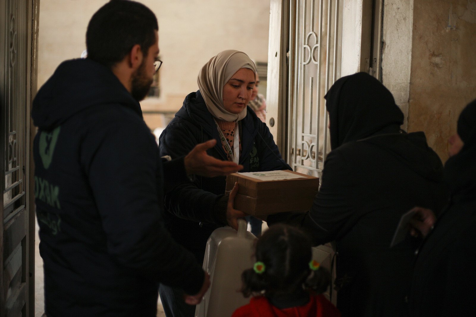 Oxfam delivering hygiene items to families in one of the shelters in Aleppo city.