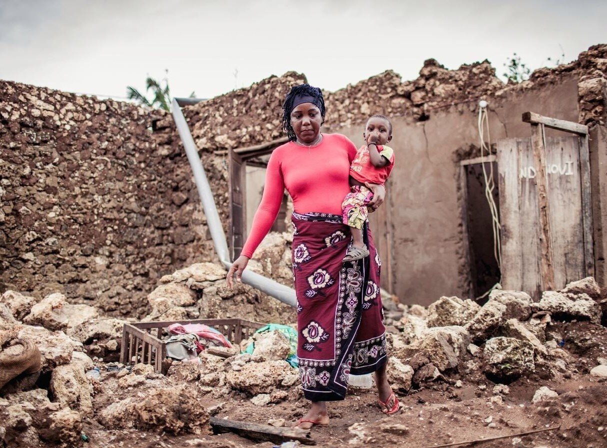 Fatuma and her son survived the cyclones, but her house was severely damaged. She still feels frightened when she thinks about what happened: ‘When the winds started, everyone was looking for a tree to hold on to so that you’re not blown away. When the rain hit your face, it was like being hit by a stone. I grabbed my kid’s bag that had a sweater and some clothes because I didn’t want them to be cold.’ (Photo: Oxfam)