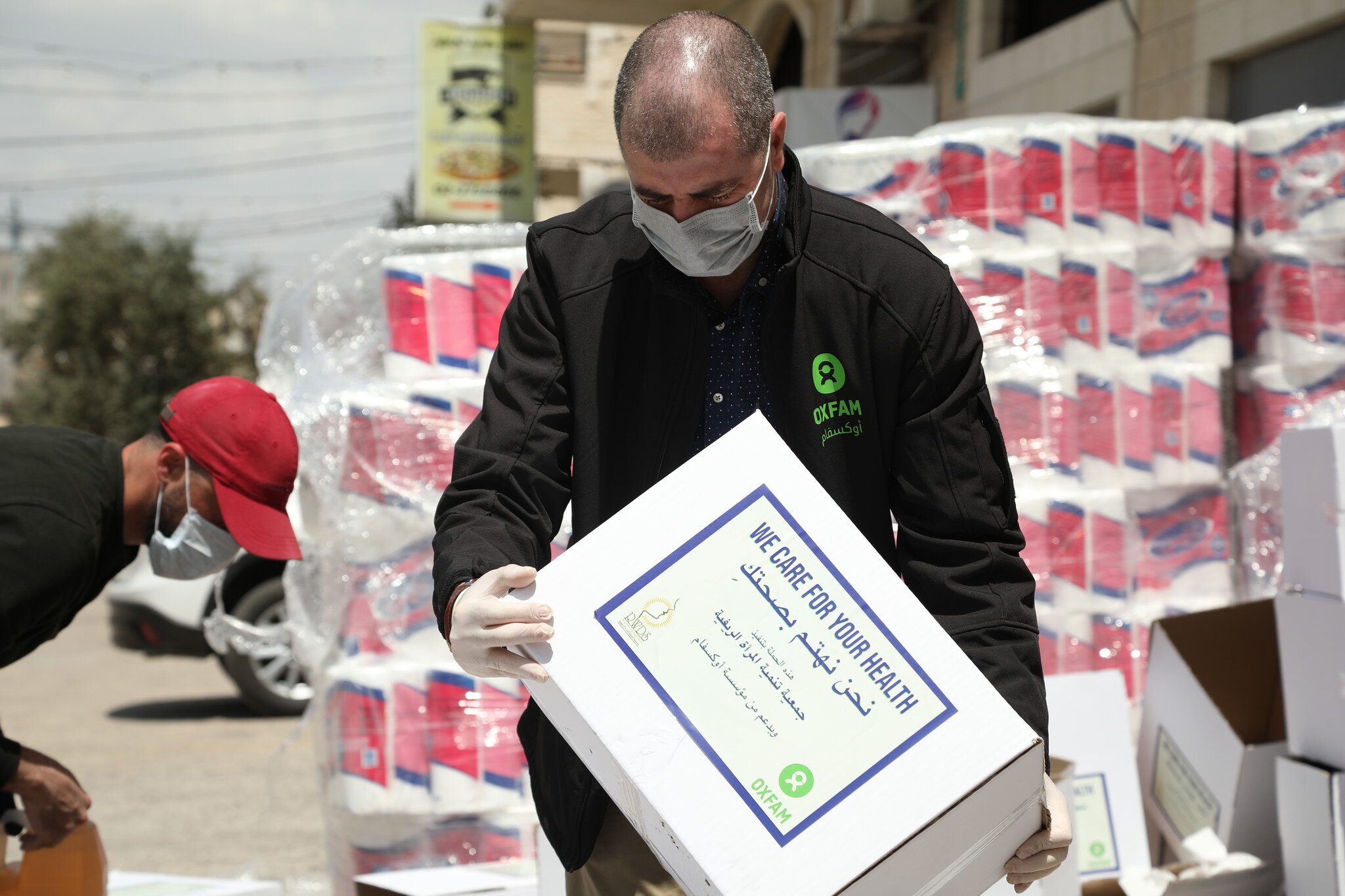 Occupied Palestinian Territory and Israel: Oxfam and local partner, Rural Women Development Society, distributing hygiene packages to families who cannot afford them during lockdown. 